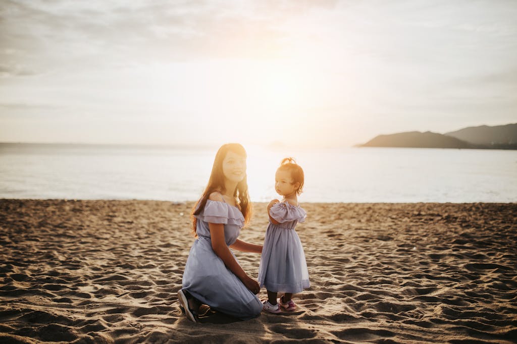 Woman and Girl by the Sea